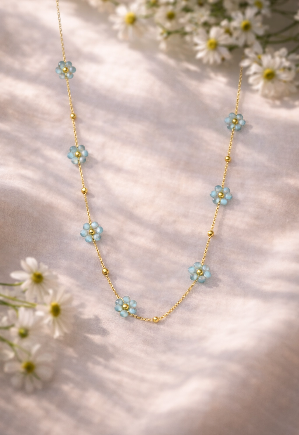 Collier Fleurs de printemps bleu ciel